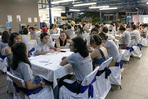 A large group of people sitting at tables Employment - Inter-American Development Bank - IDB